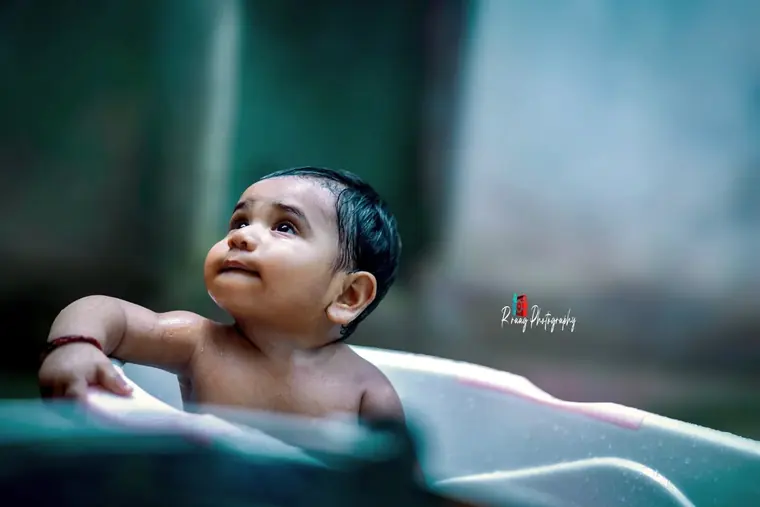 Baby looking up during bath time