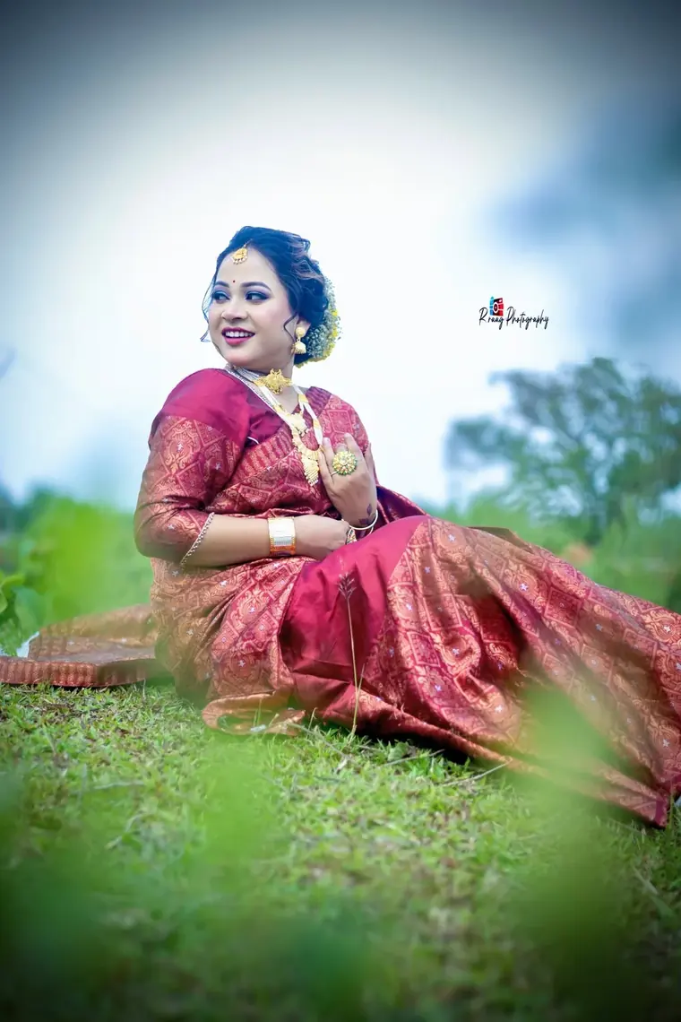 Pre-wedding portrait on open grass
