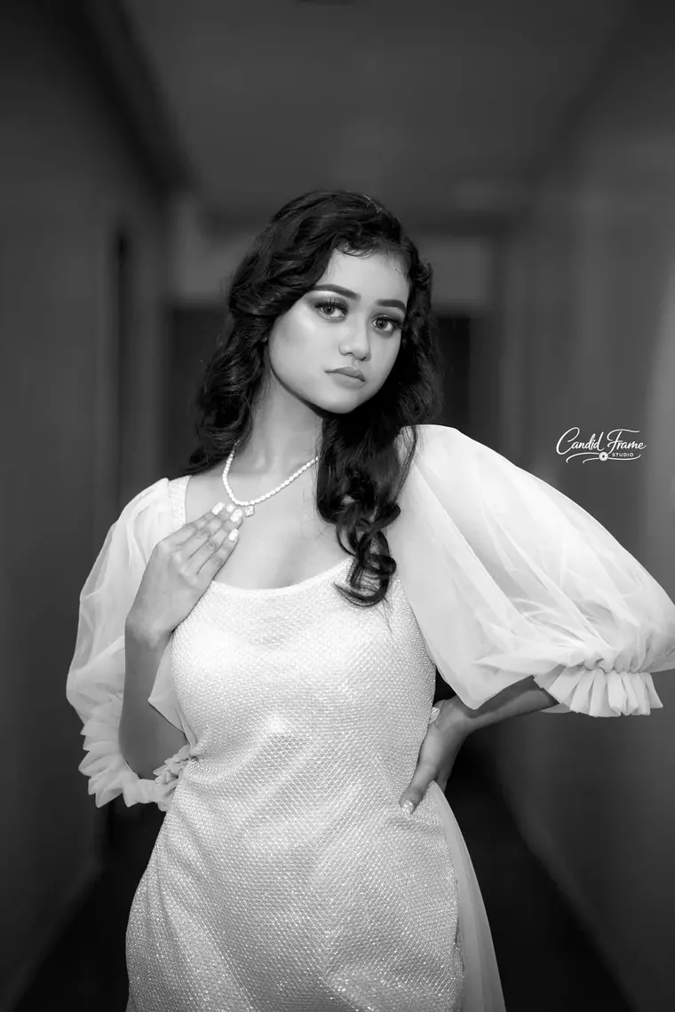 Monochrome editorial portrait in the corridor
