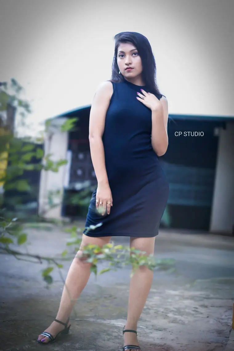 Editorial portrait in a black dress