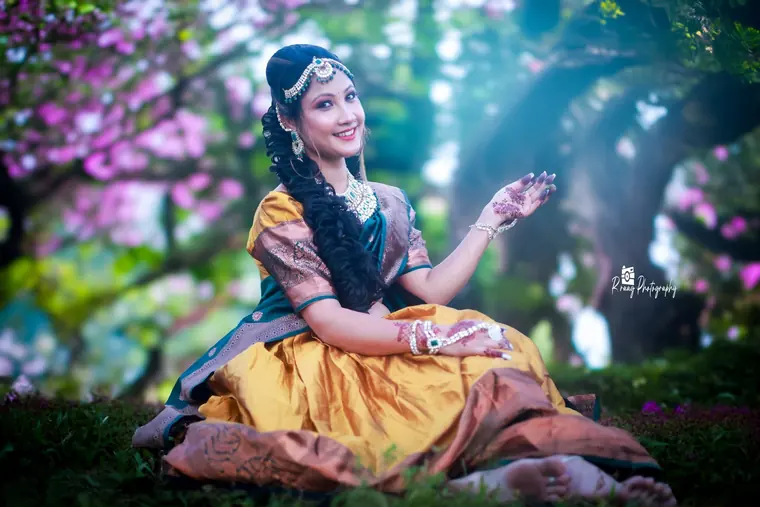 Conceptual garden portrait in a yellow lehenga